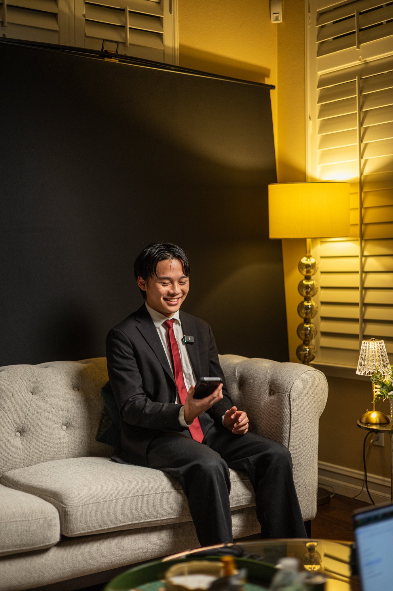 Interview setup with couch and backdrop
